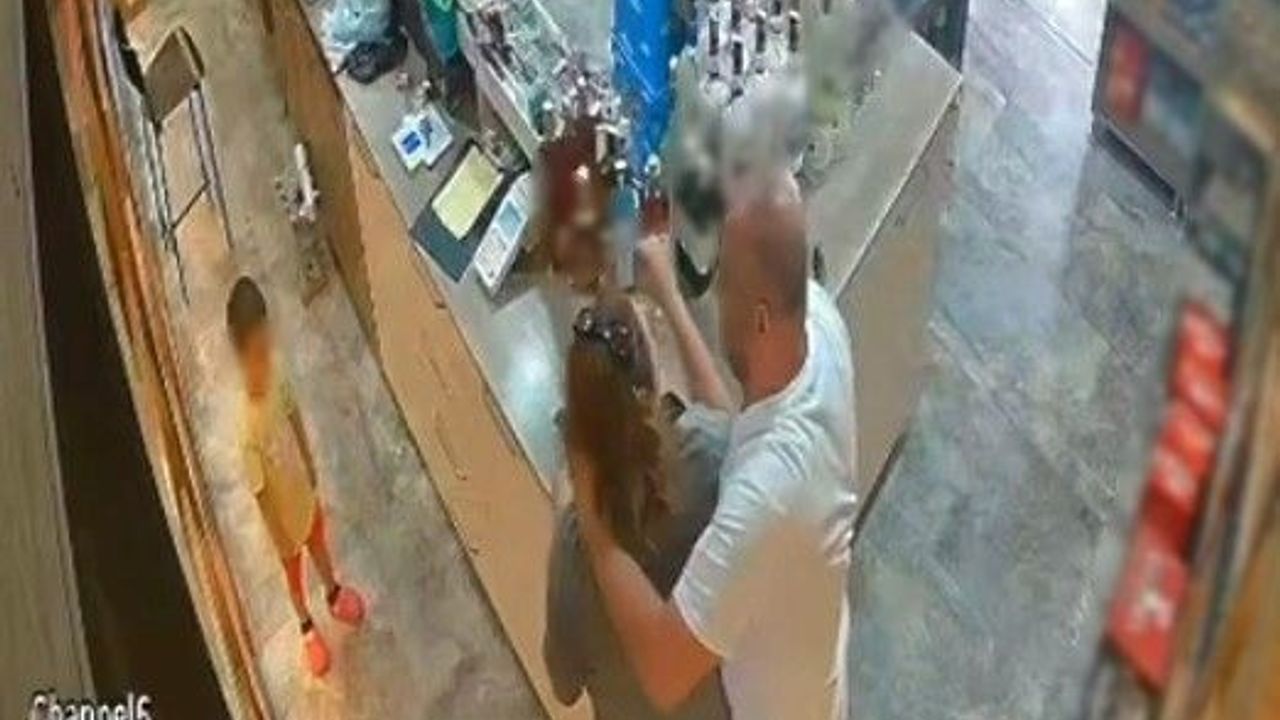 İzmir'de eşini çocuğu önünde darp edip boğmaya çalıştı: Tutuklama